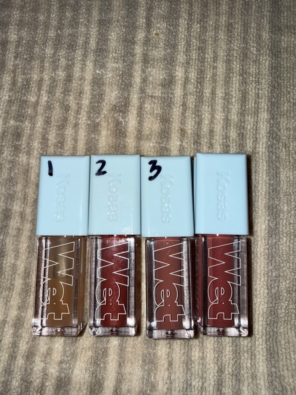 Kosas Wet Vinyl Mini Lip Gloss Set — Warm Tan to Deep Berry Shades (4)
